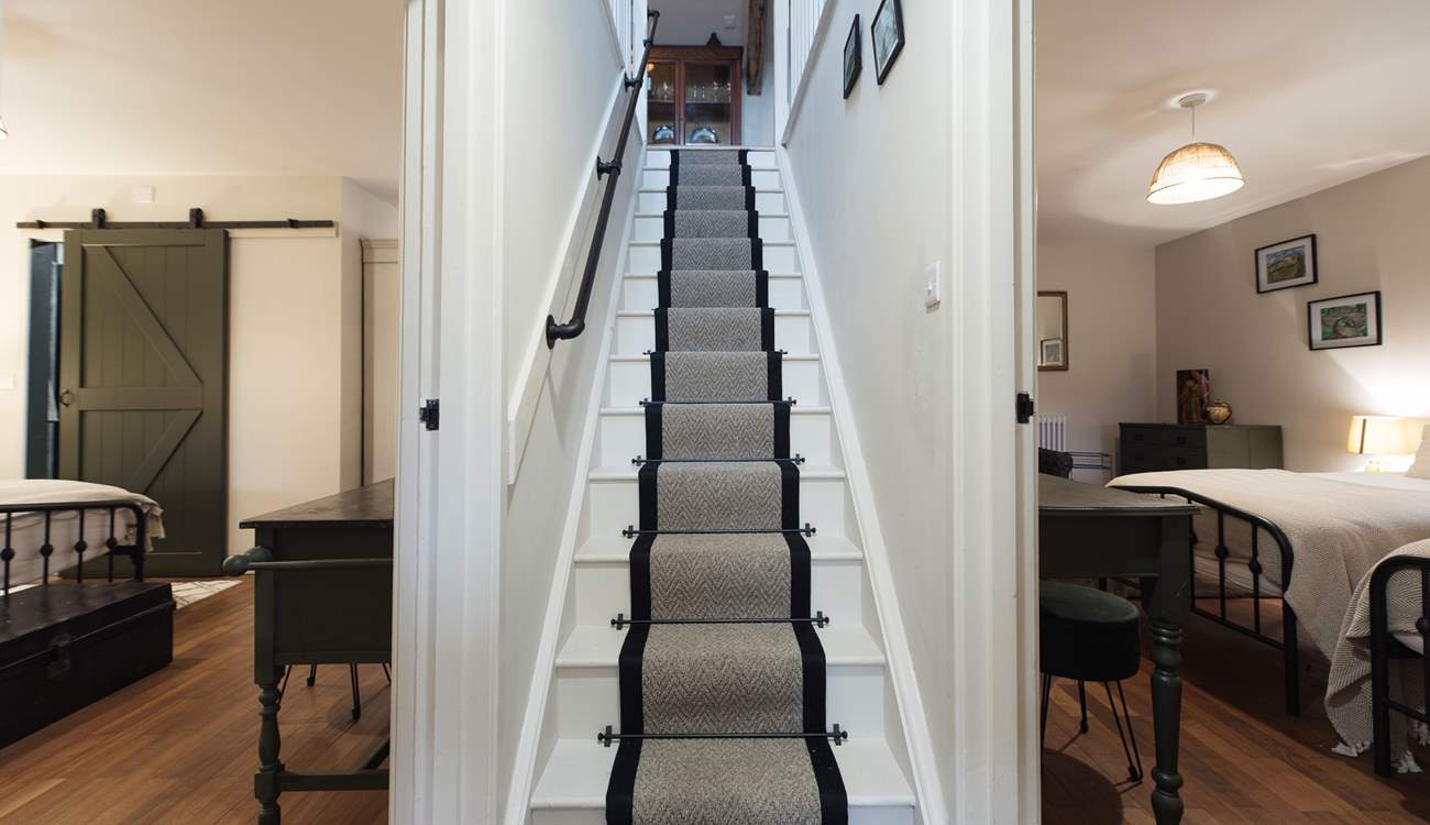 Stairs leading to the first floor in The Stables. 