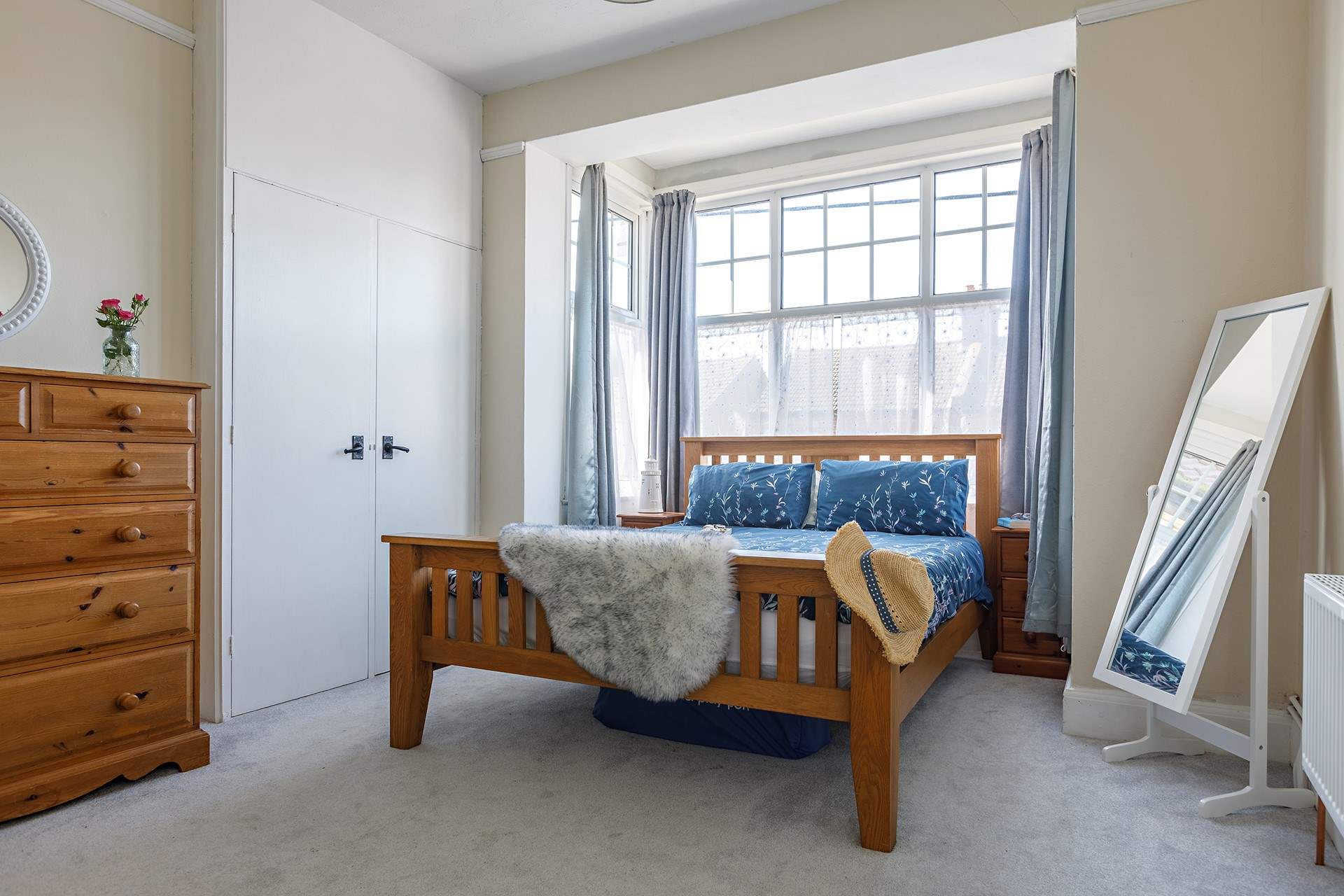 The main bed sits nicely in the bay window where the light floods in, you may hear the waves with the changing tides.