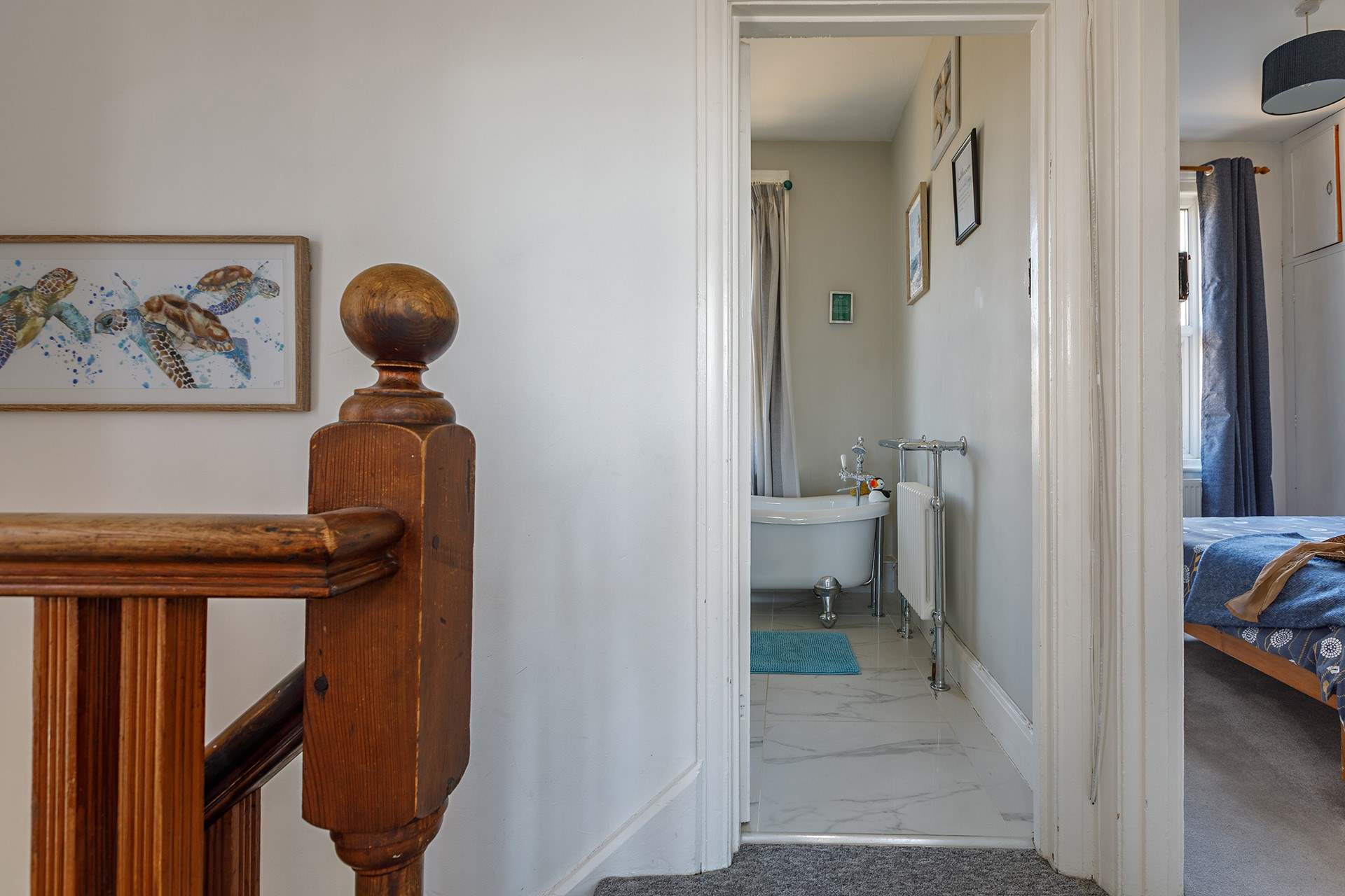 Climb the stairs to the three bedrooms and where a luxury bathroom awaits.