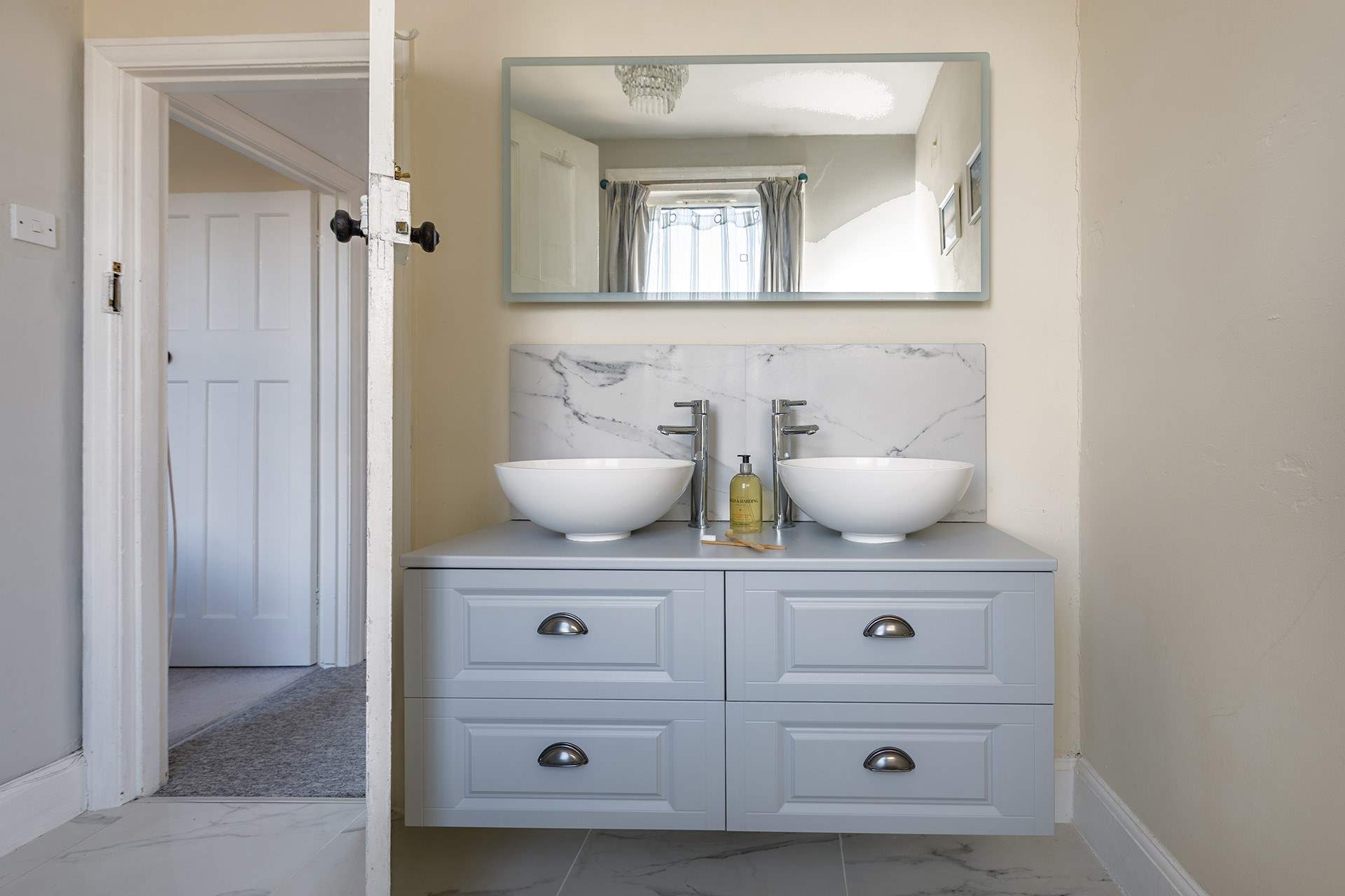 Room for two with twin basins in the family bathroom.