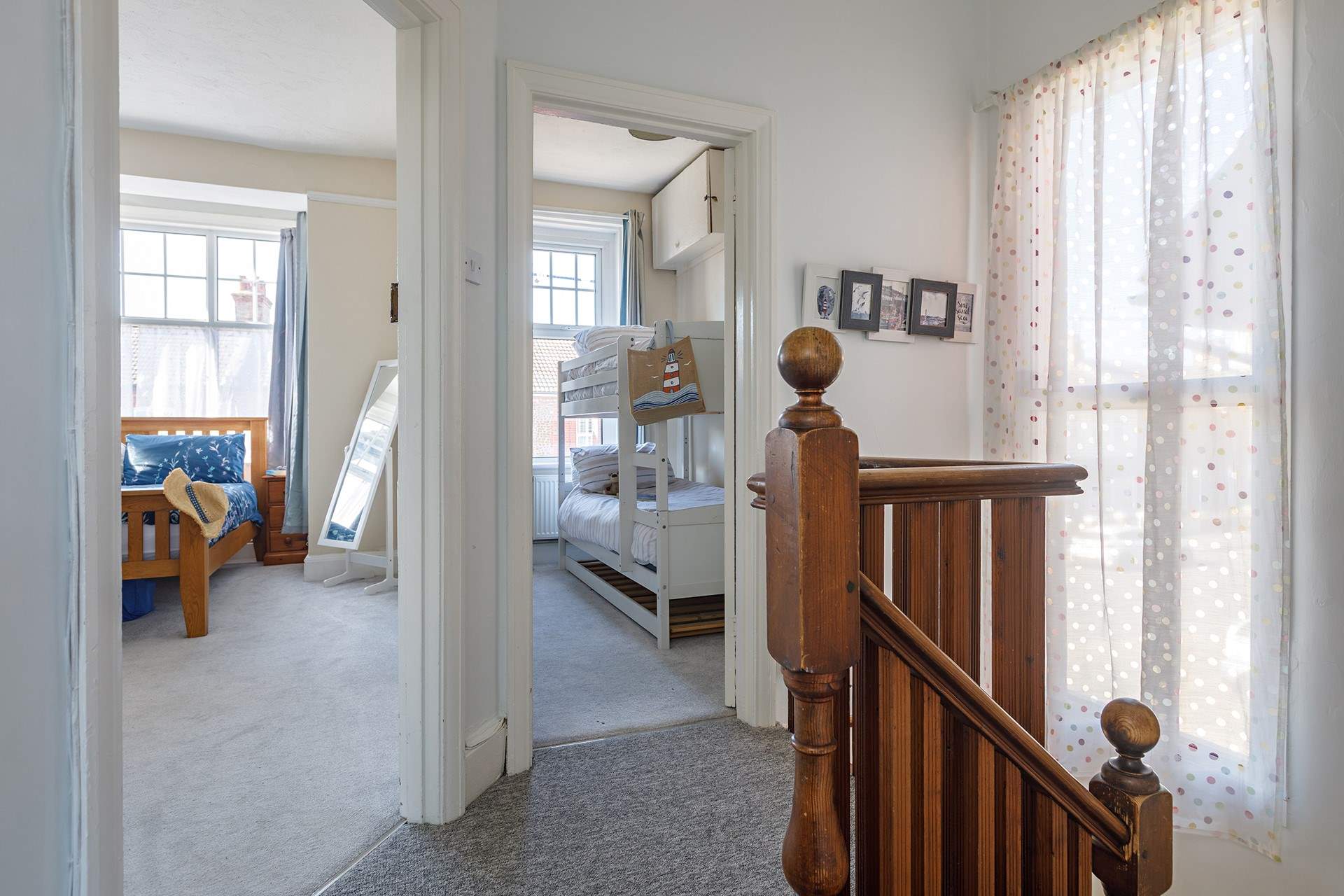 A large double bedroom and full-size bunks enjoy a westerly aspect, even a sea glimpse!