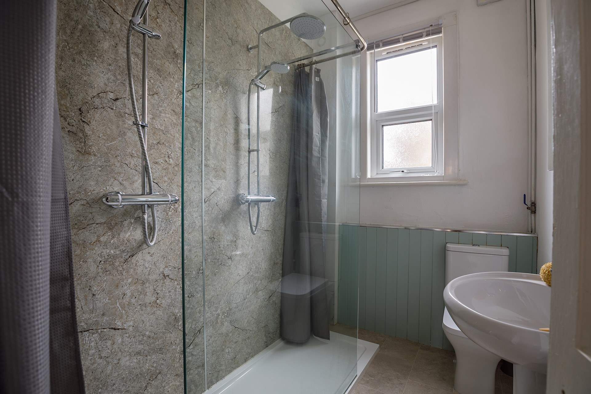 The downstairs double shower is perfect for washing off those sandy toes after a fun day on the beach, children will love it!