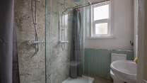 The downstairs double shower is perfect for washing off those sandy toes after a fun day on the beach, children will love it!