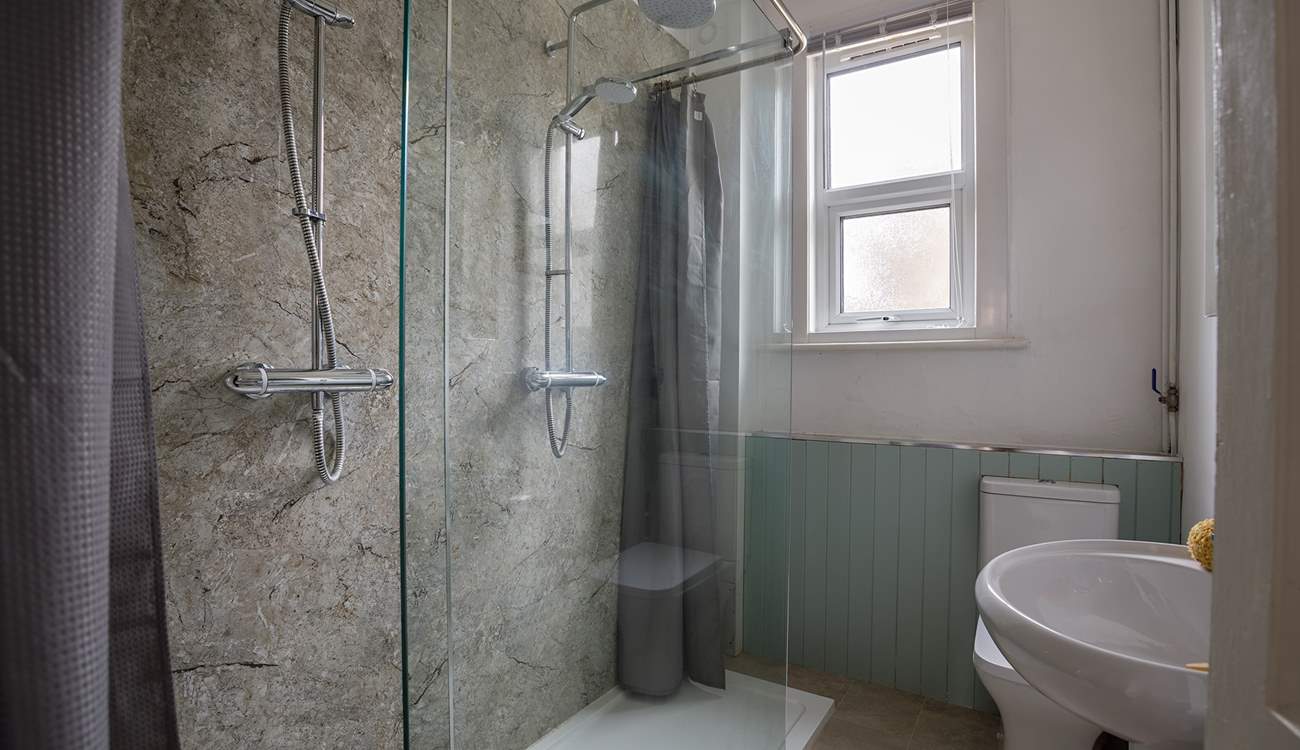 The downstairs double shower is perfect for washing off those sandy toes after a fun day on the beach, children will love it!