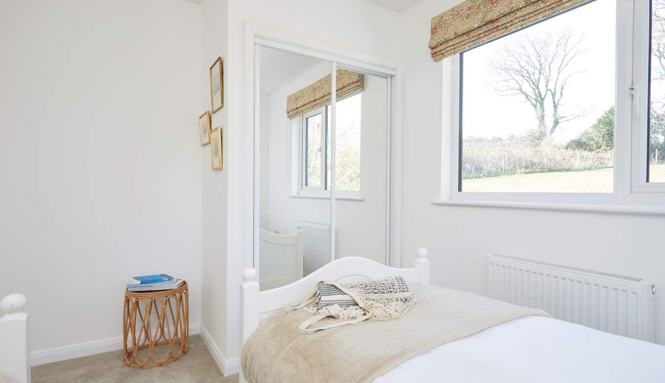 Bathed in natural light and with a tranquil outlook, this is a calming space to retreat to.