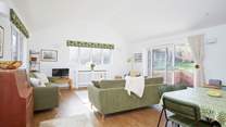 This modern property welcomes you in and has plenty of space inside and out for all the family.