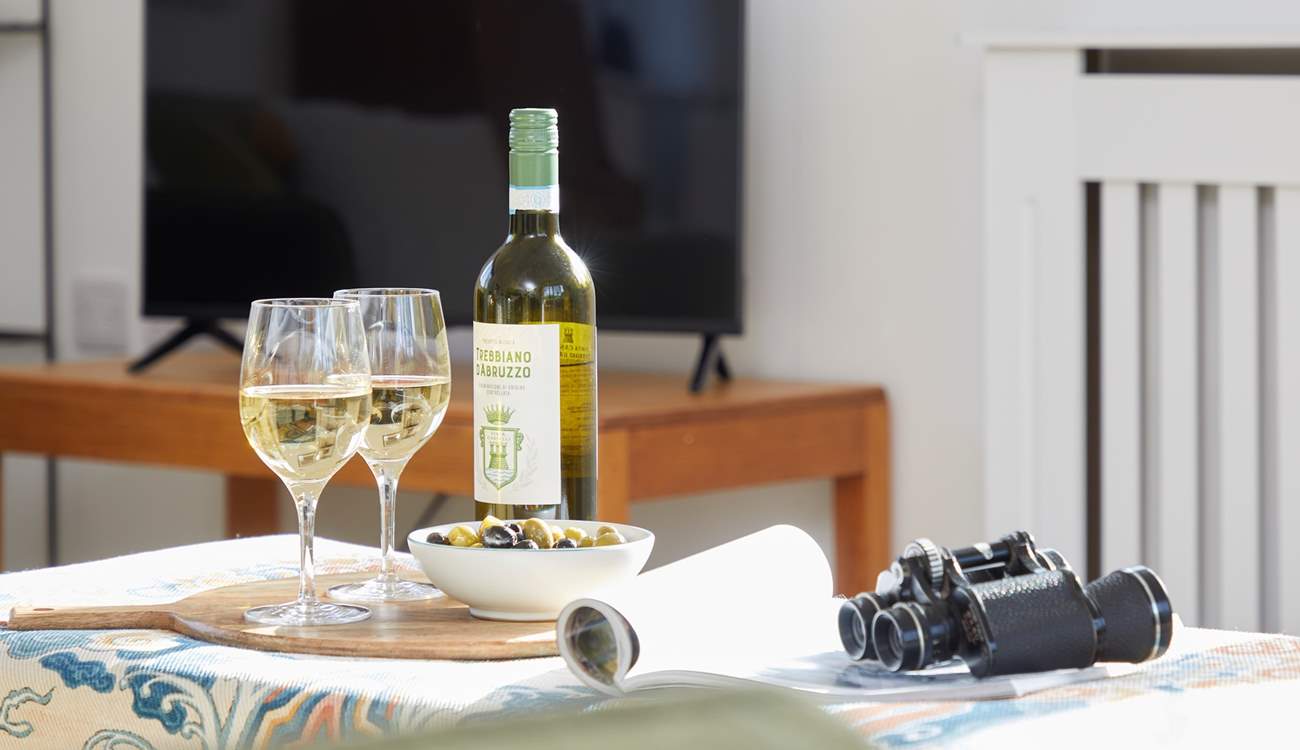 Reminisce about your day over a glass of something nice.