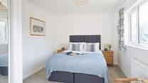 Bedroom 1 with flexible 'zip and link' beds can be arranged as small twin beds or a king-size double.