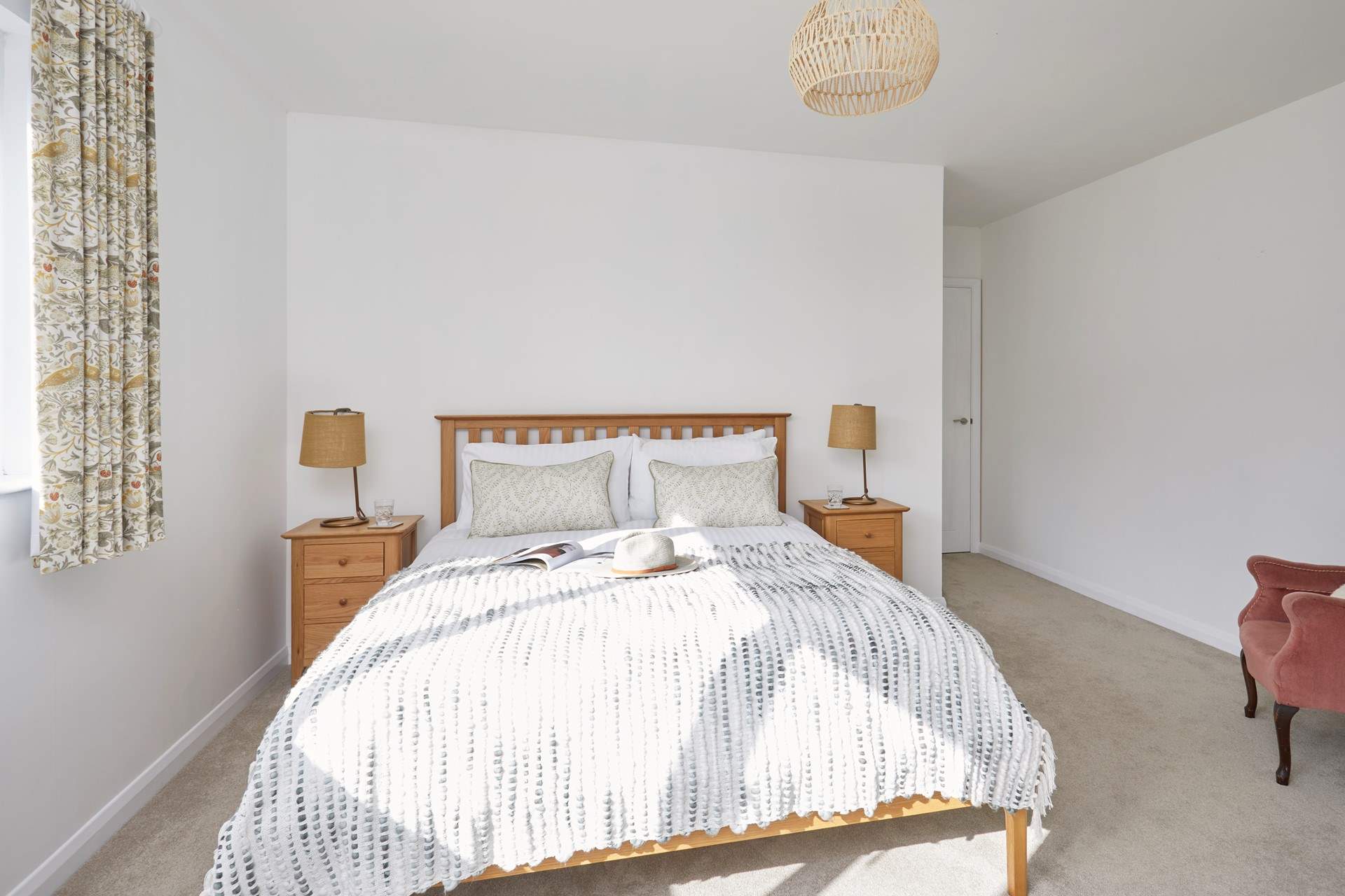 Bedroom 3 with king-size bed is situated to the front of the property.