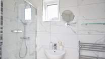Bedroom 3 benefits from its own en suite shower-room.