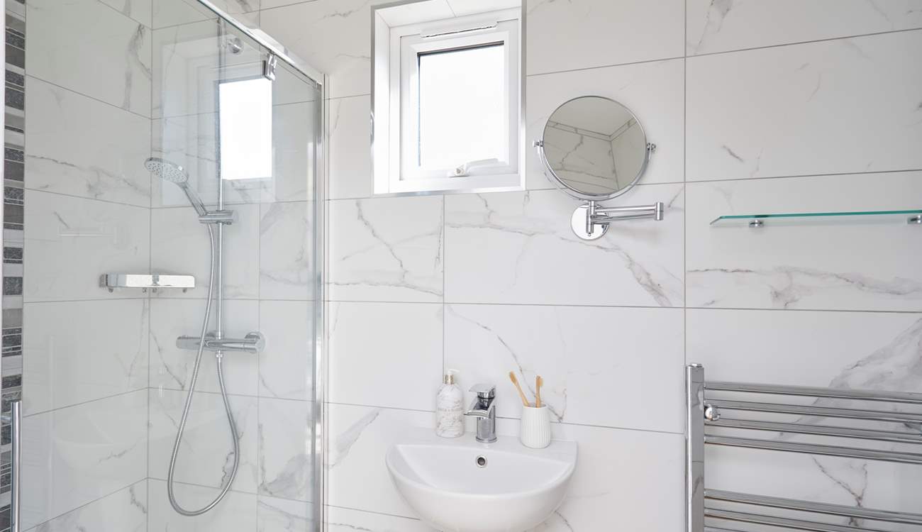 Bedroom 3 benefits from its own en suite shower-room.