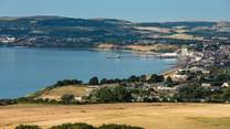 Take in the views from the Downs towards Sandown Bay.
