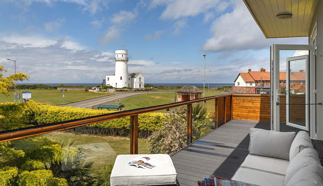 Step outside to the balcony and take in the view.