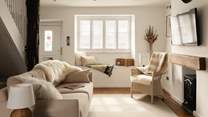 The delightfully calm and serene sitting-area of The Bothy welcomes you. 