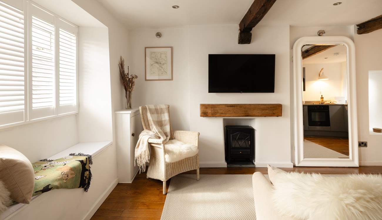 The plantation shutters let the dappled sunlight in.