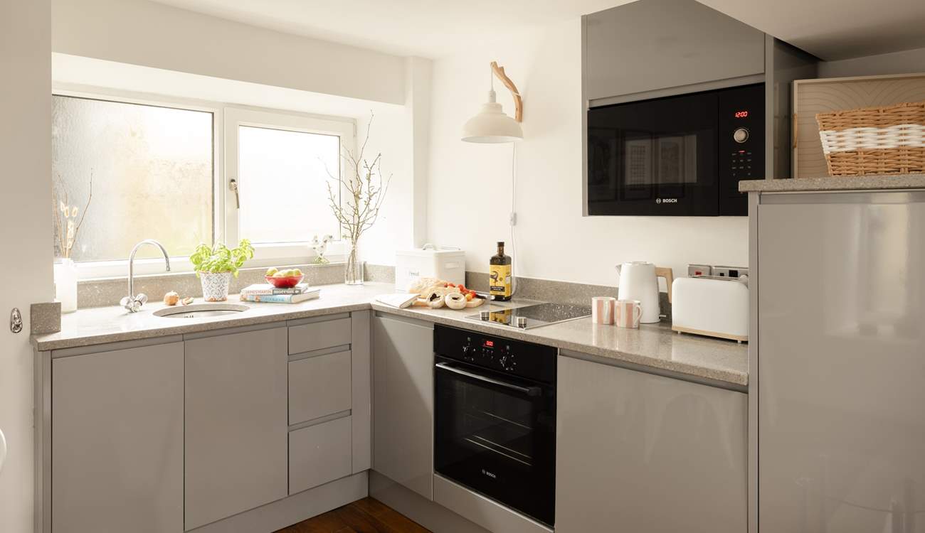 The kitchen has a two ring hob and everything you need to delight with culinary creations. 