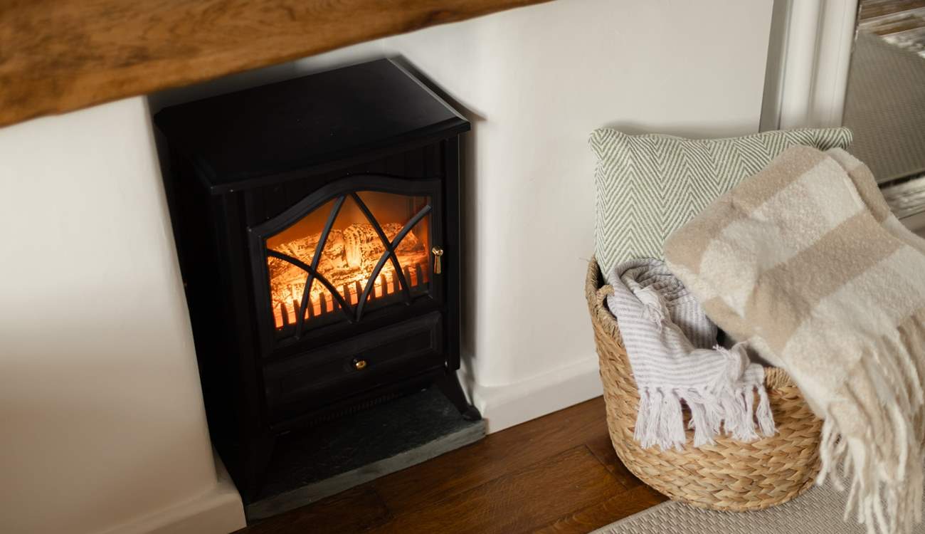 The electric wood-burner makes the cottage cosy all year round. 
