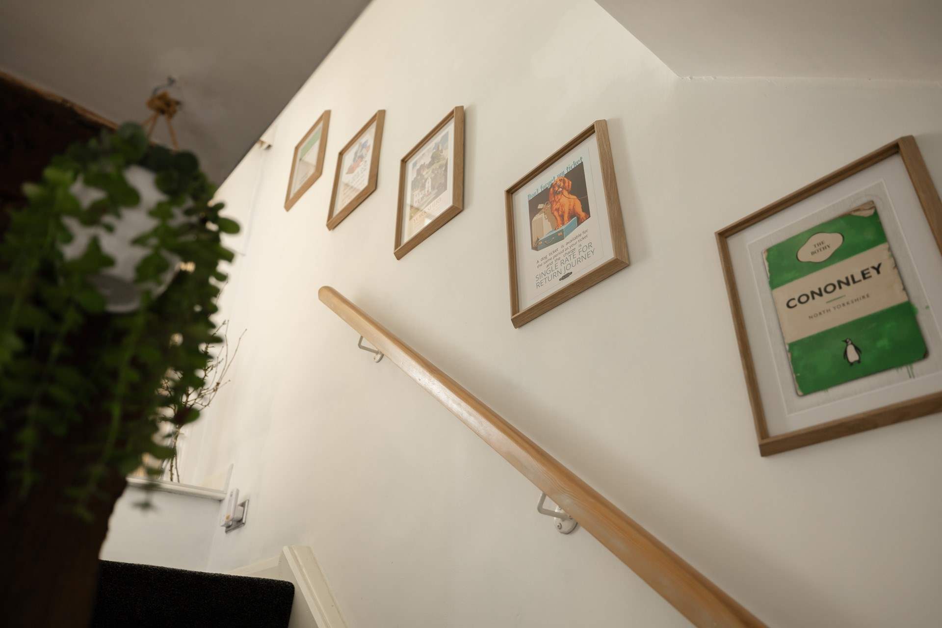 The staircase has quirky artwork.