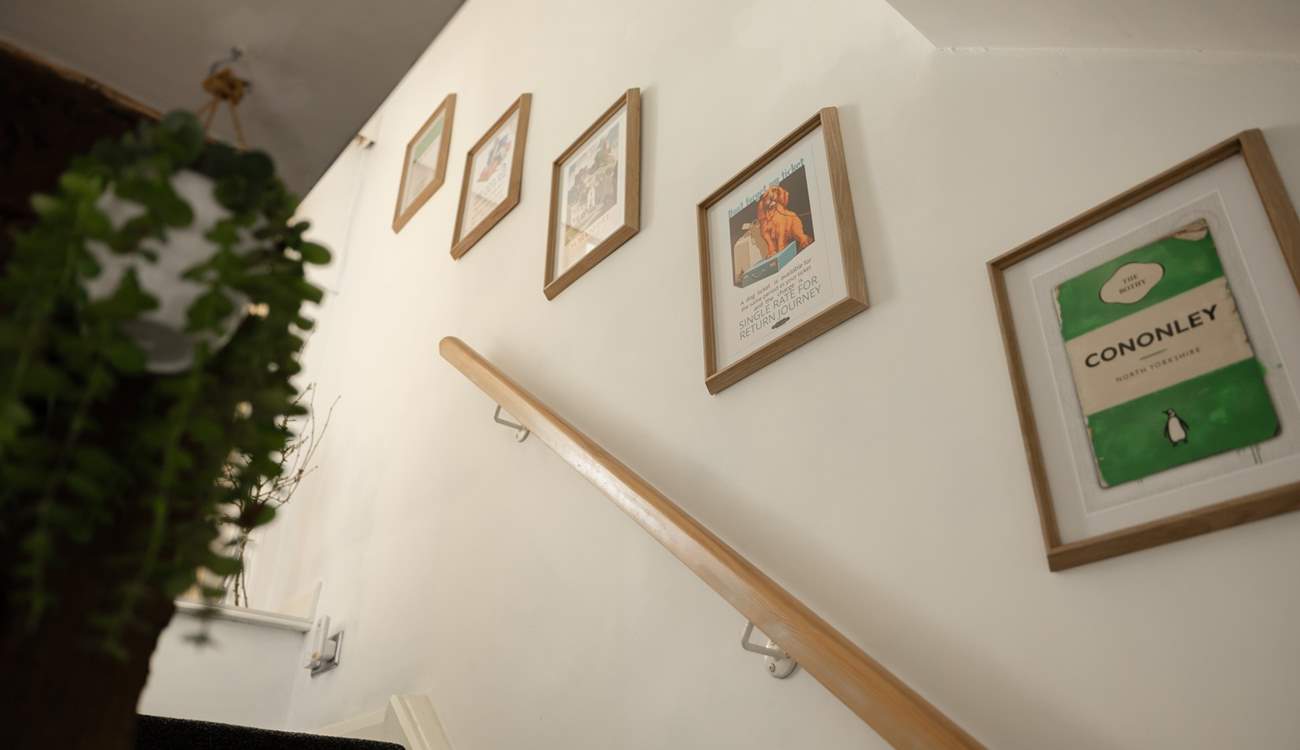 The staircase has quirky artwork.