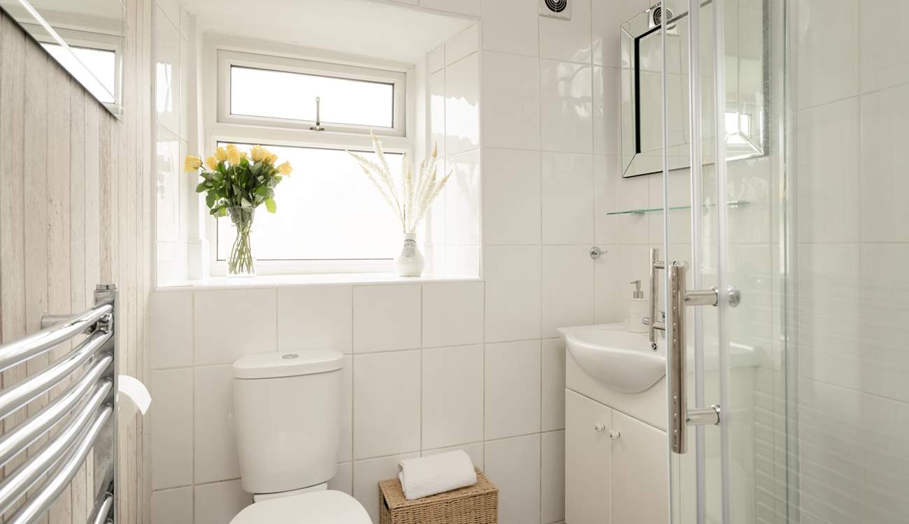 The shower-room is just steps from the bedroom.