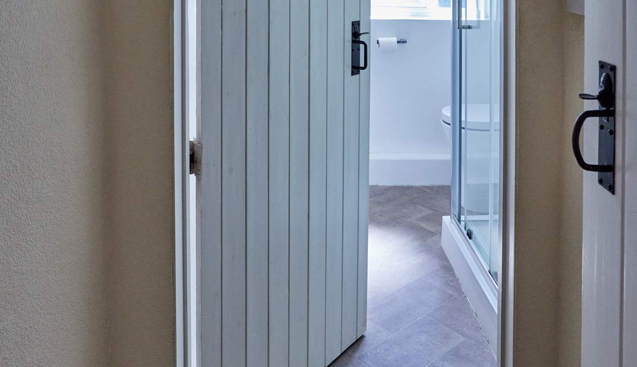 Please mind the step up into the shower-room.