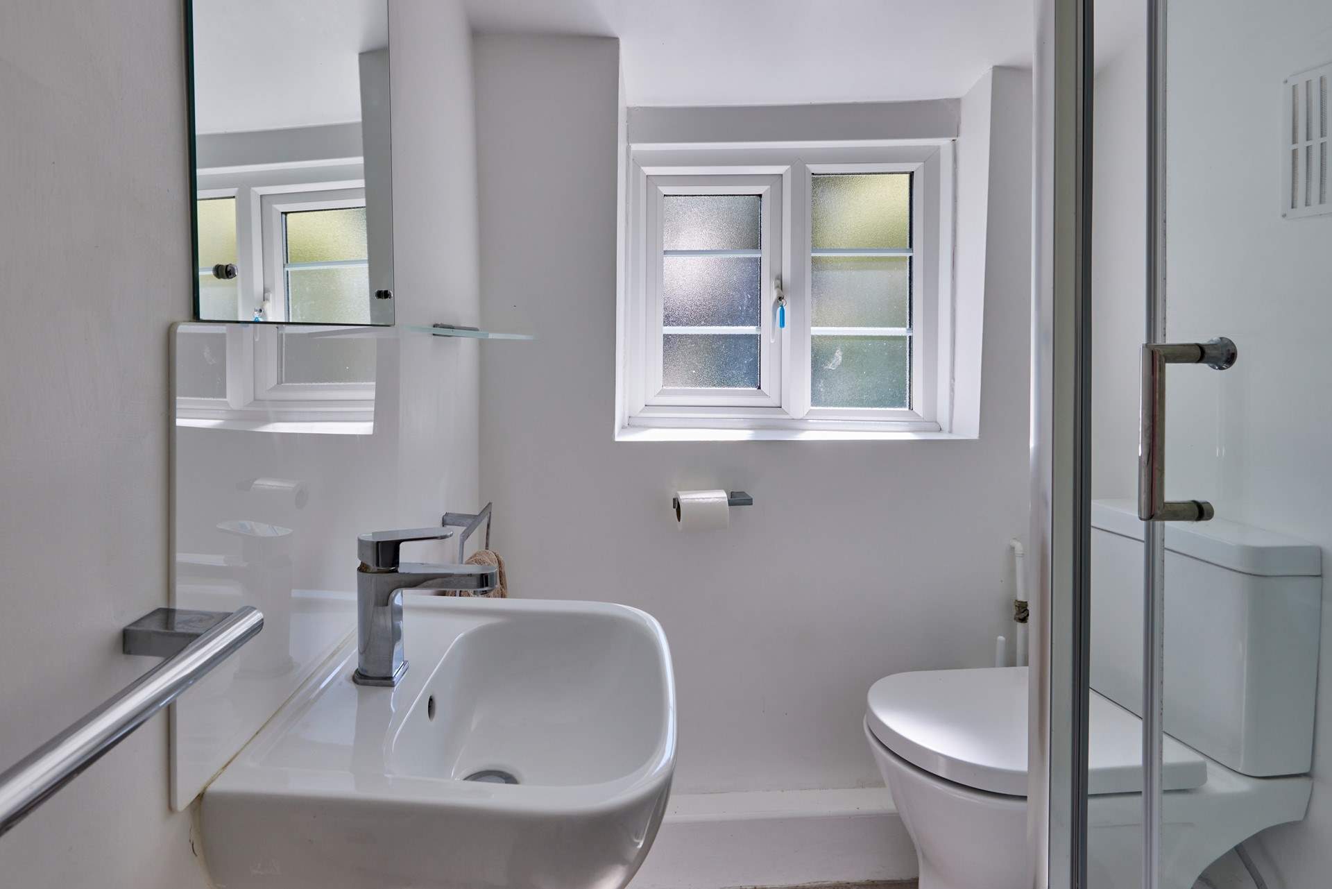 The shower-room is bright and modern with a lovely power shower.