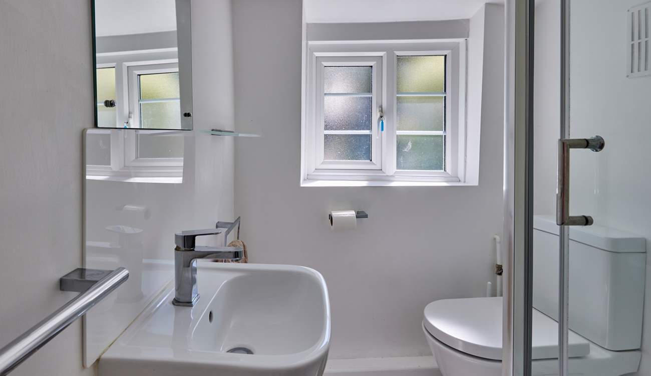 The shower-room is bright and modern with a lovely power shower.