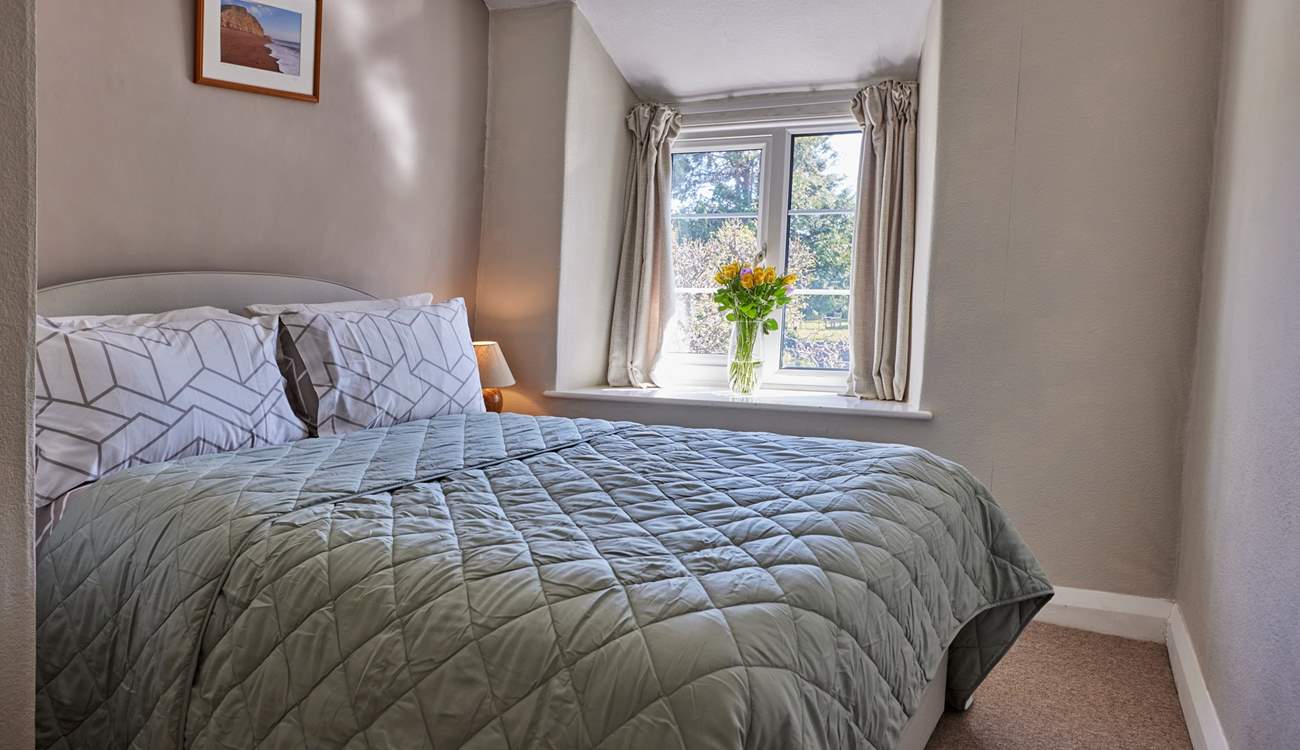 The first bedroom is a lovely double with garden views. The cottage is on a cul-de-sac with no passing traffic which this makes it an incredibly quiet and peaceful place to rest your head.