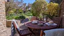 The south-facing garden is an absolute treat - perfect for fun on the lawn or a spot of al fresco dining on the lovely patio.