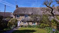 Outside you have the quintessential English country garden. It is absolutely blissful and enclosed for your four-legged friends.