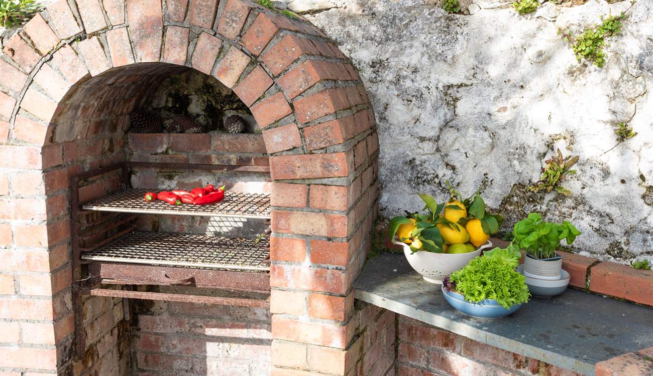 Fire up the large brick barbecue and dine under the sky.