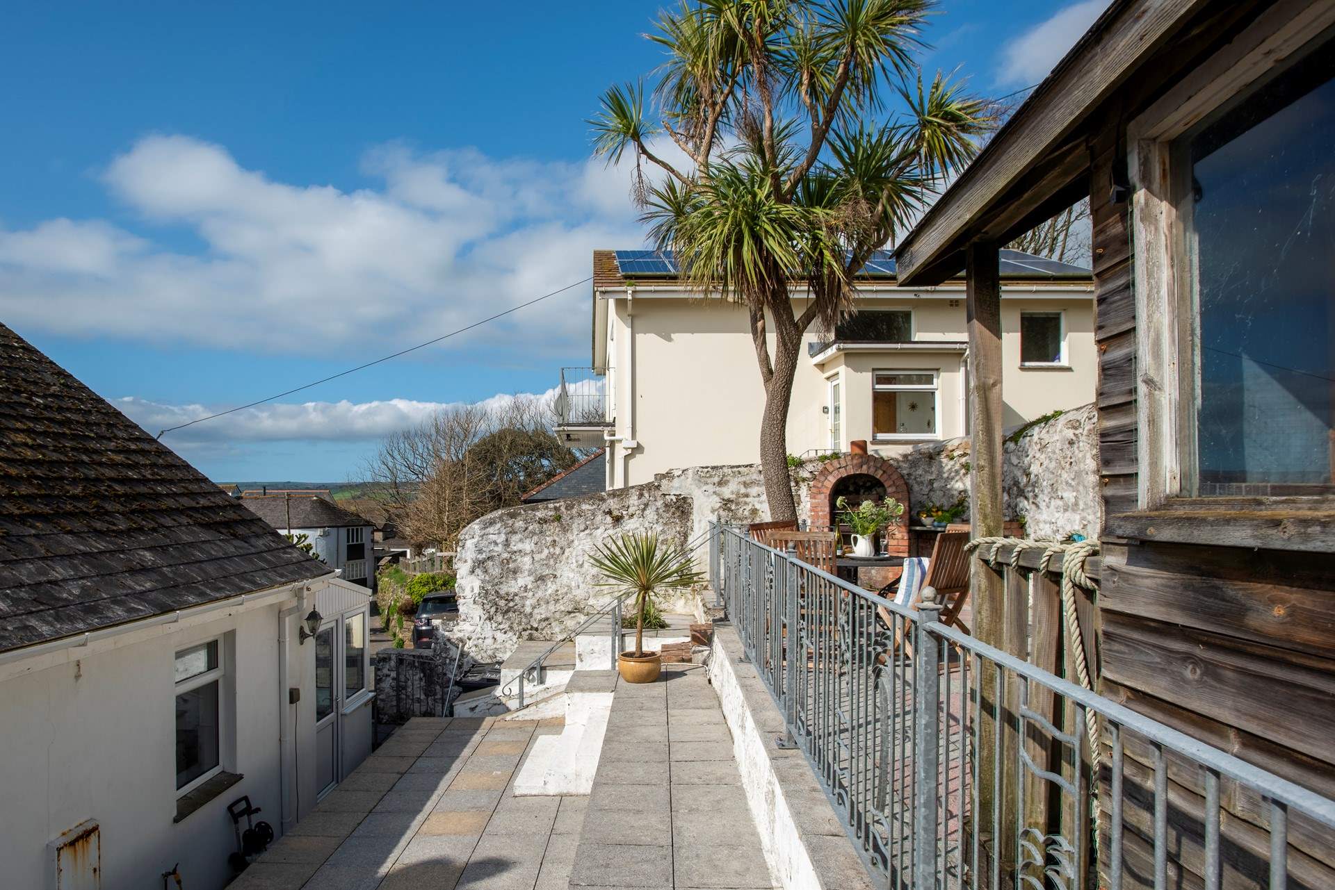 To the rear there are several levels, although the lower level is not used, please take care with small children as there is a drop here and be mindful of the steps. 