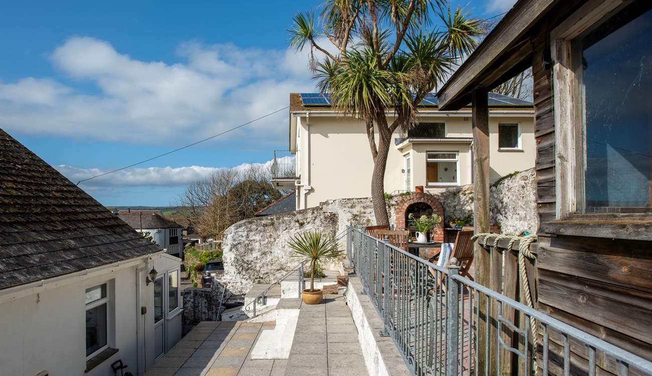 To the rear there are several levels, although the lower level is not used, please take care with small children as there is a drop here and be mindful of the steps. 