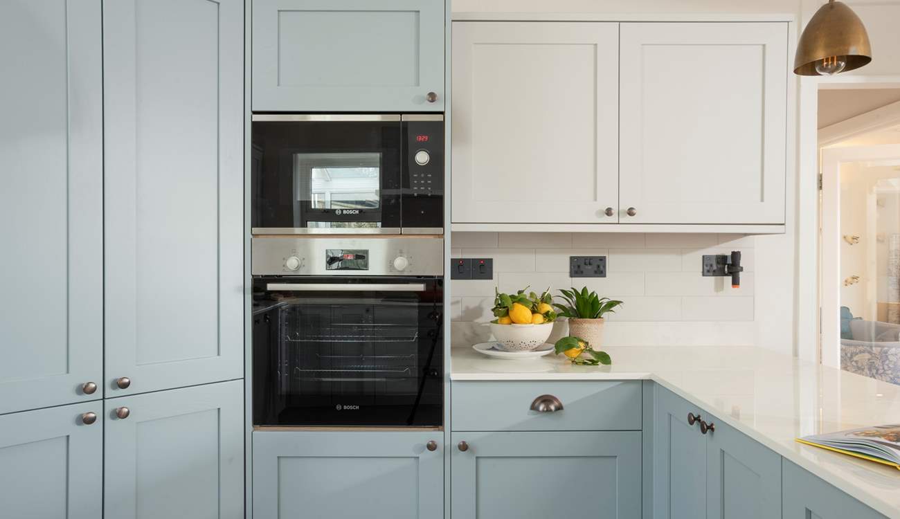 The kitchen has all you need to cater for the family including an air fryer.