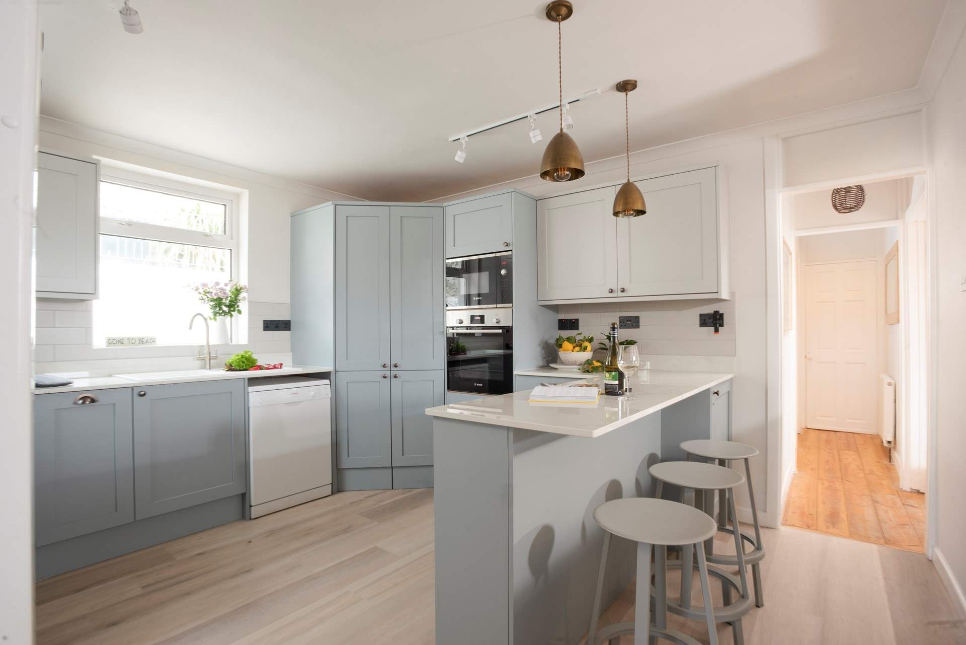 A social space with a small breakfast bar.