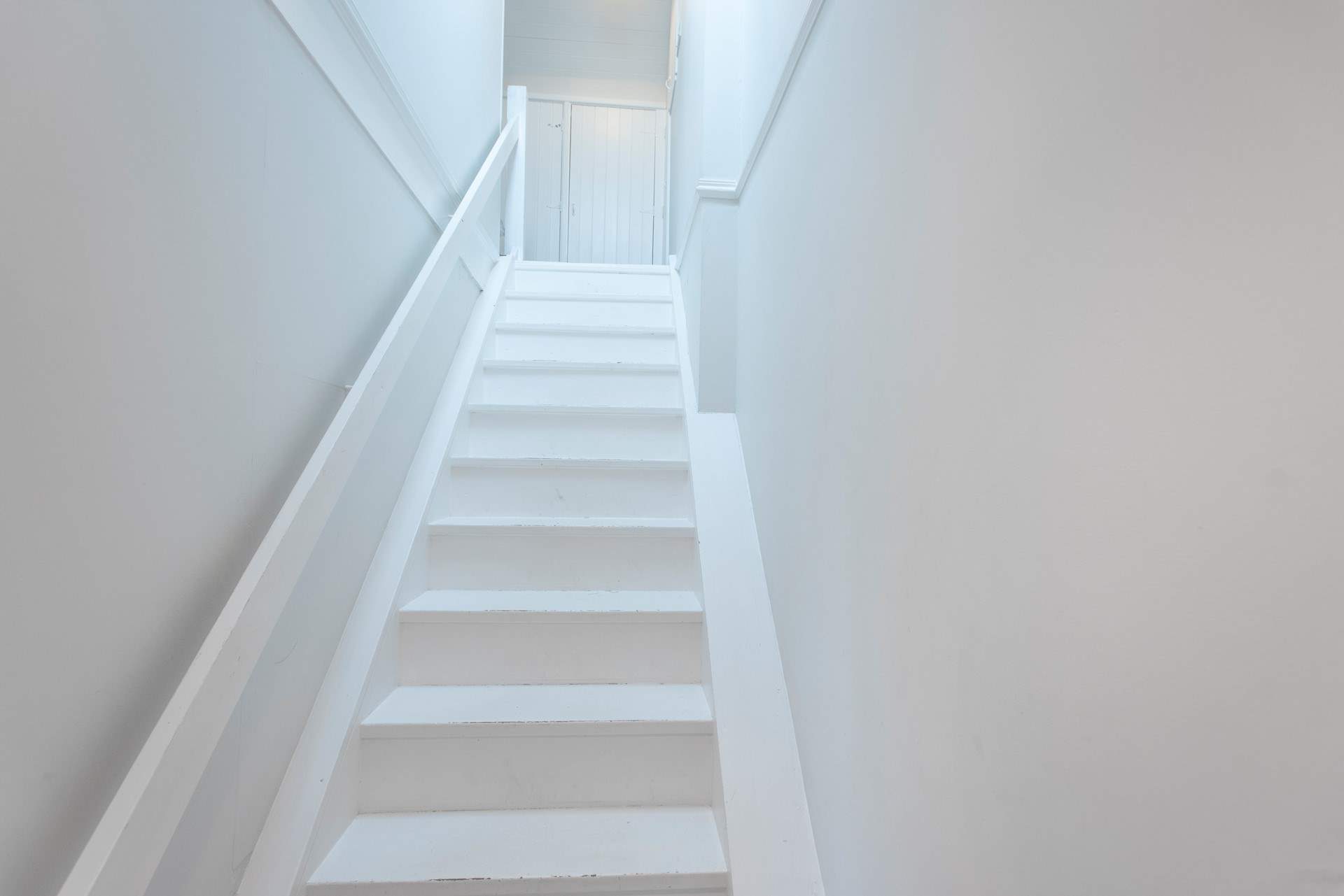 The stairs leading to bedroom 3.