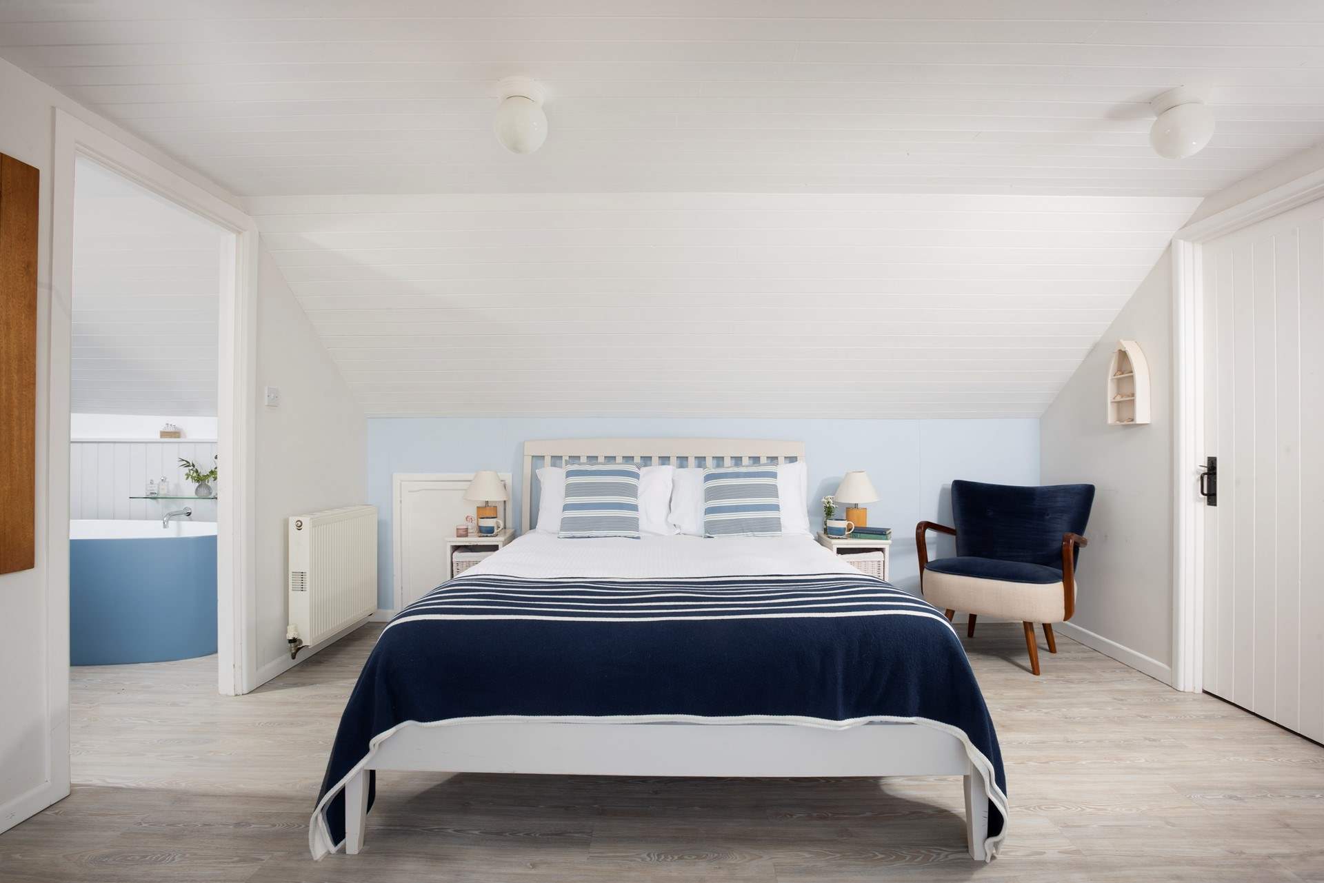 A private space with an en suite bathroom.