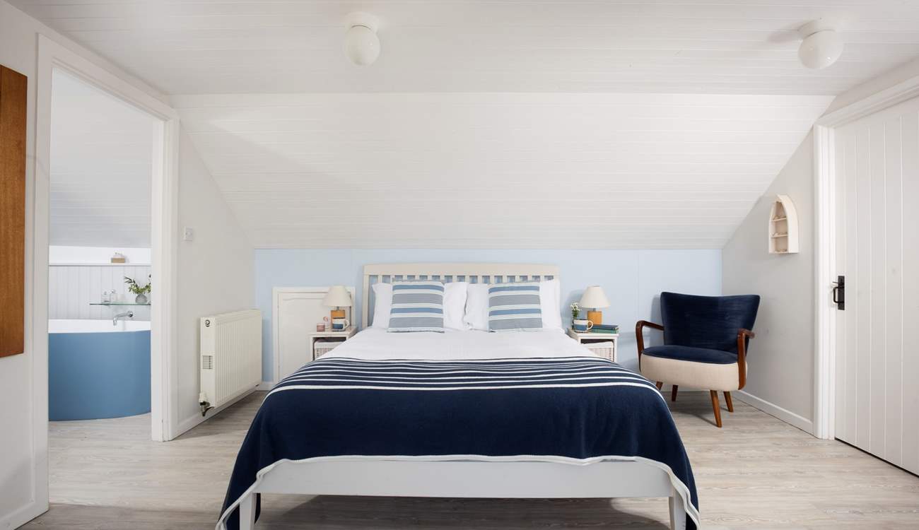 A private space with an en suite bathroom.