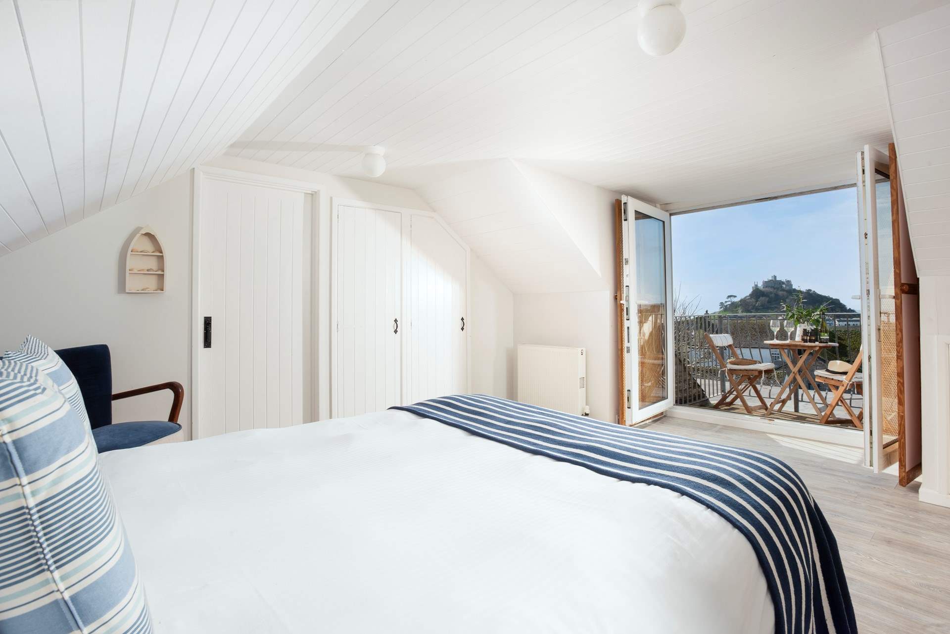 The upstairs suite has a small balcony with a beautiful view.