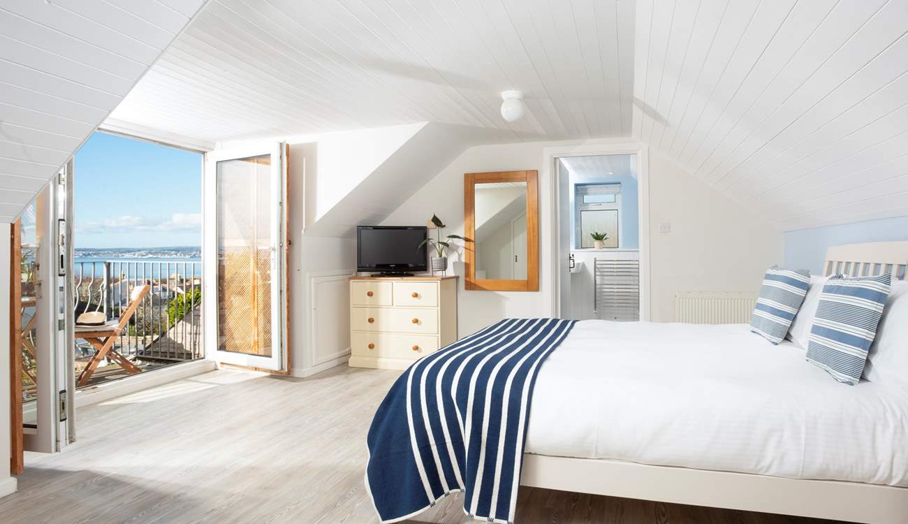 Wake up in king-size bedroom 3 where sea views greet you each morning.