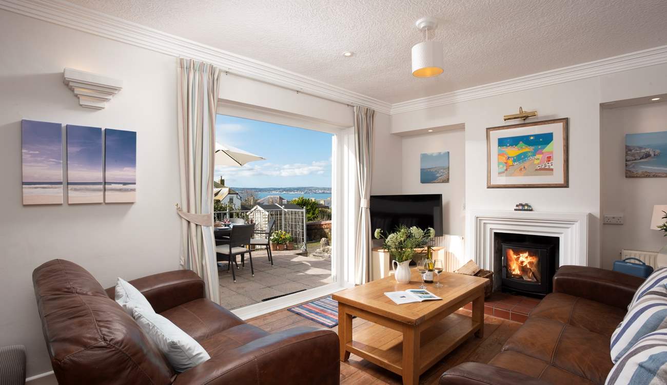 Throw open the doors from the cosy living area and let the sea air in.