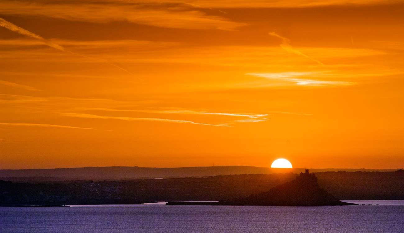 Watching the sun sink behind the castle.