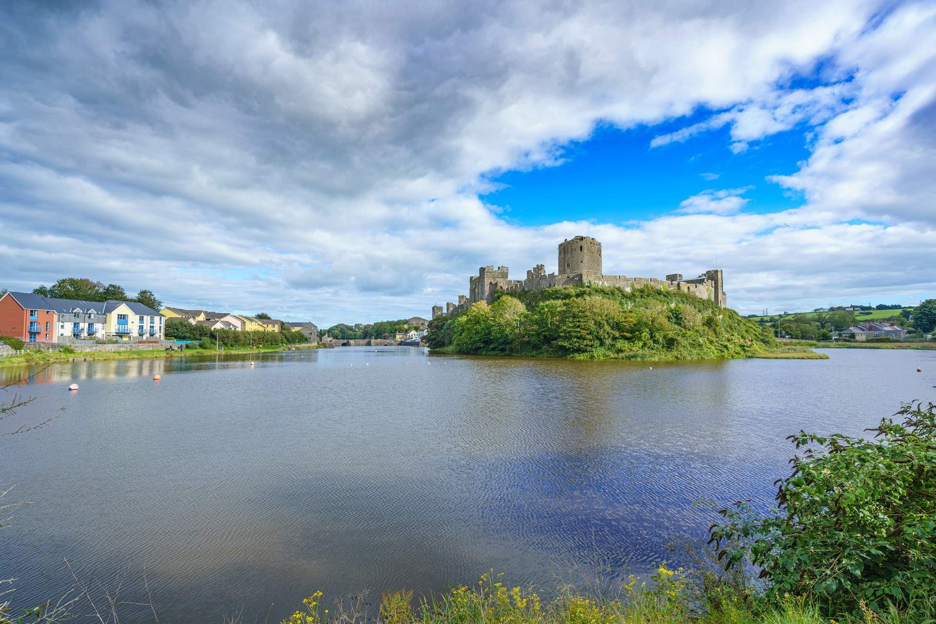 There are several castles nearby. Pembroke (pictured), Manobier and Carew. 