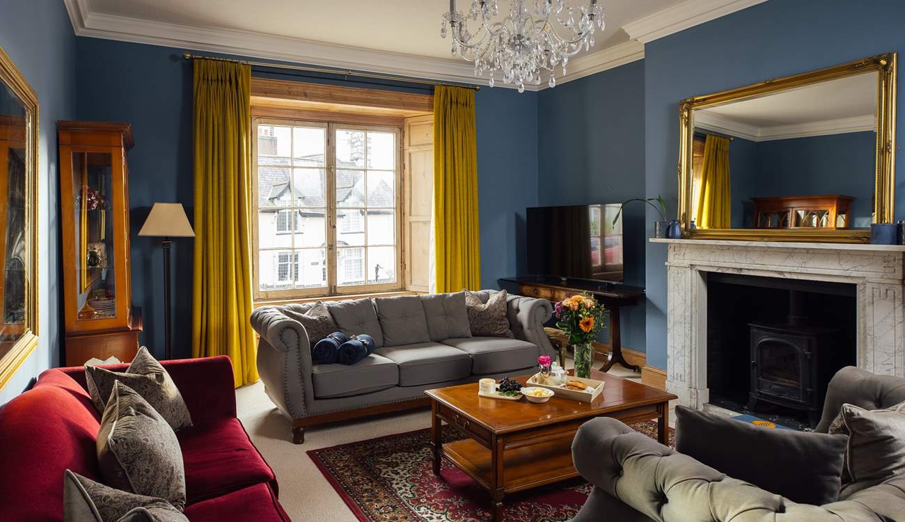 Gather in the elegant sitting-room. 