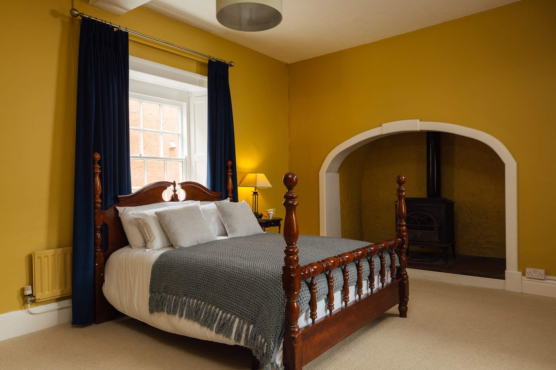  The calming hues of the hushed ground floor en suite bedroom. 