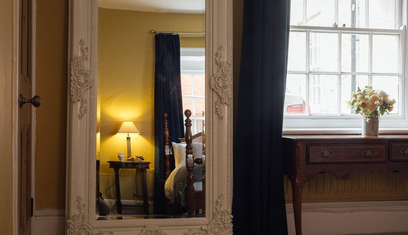 Opulent furnishings with luxurious linens. 