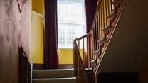 Climb the imposing staircase to three further en suite bedrooms, family bathroom, sun-room and balcony. 
