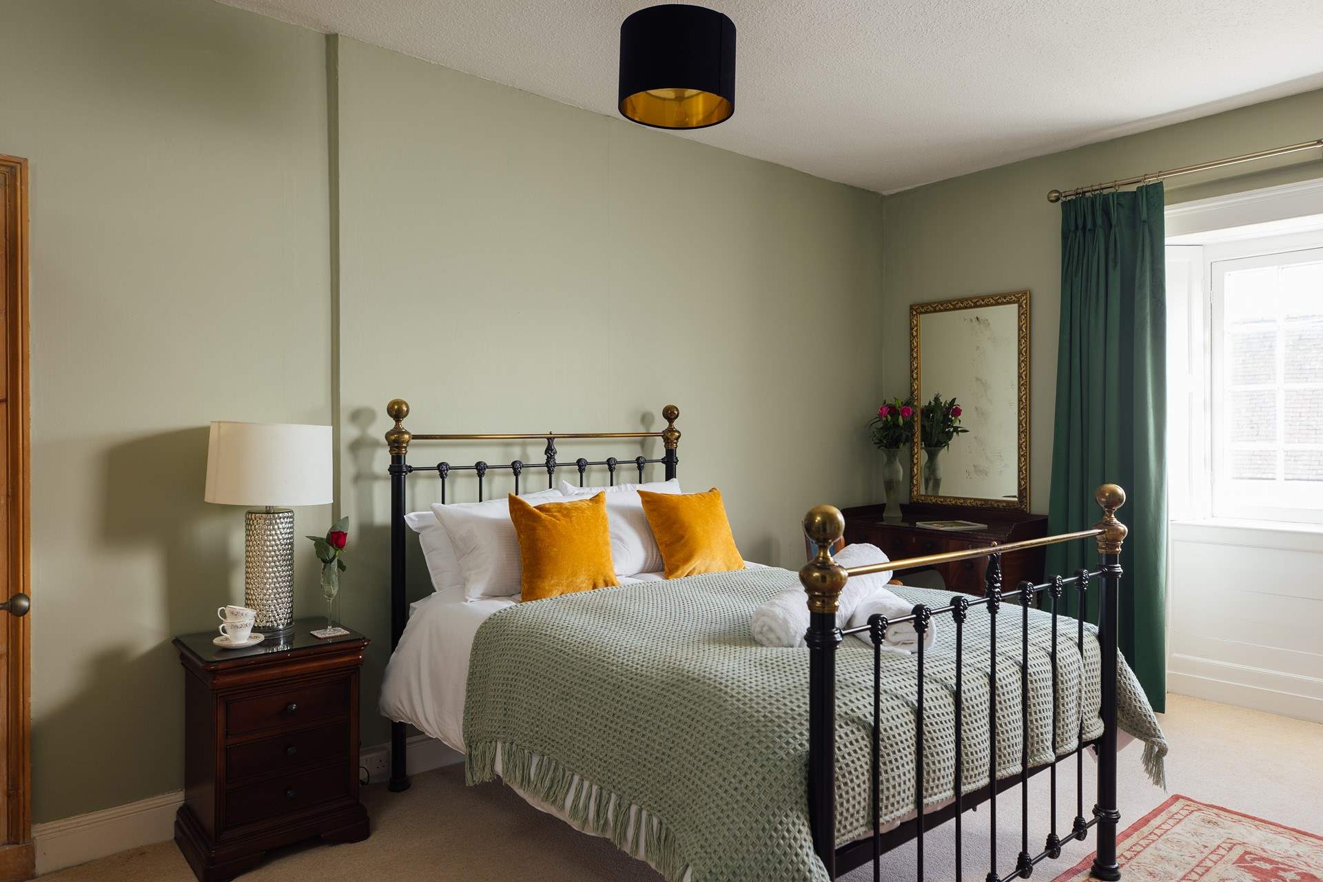 Choose from four double en suite bathrooms. Facing the front of the house, look across to the scenic views. 