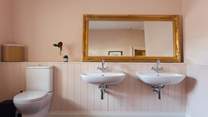 Pretty pinks in the family bathroom. 