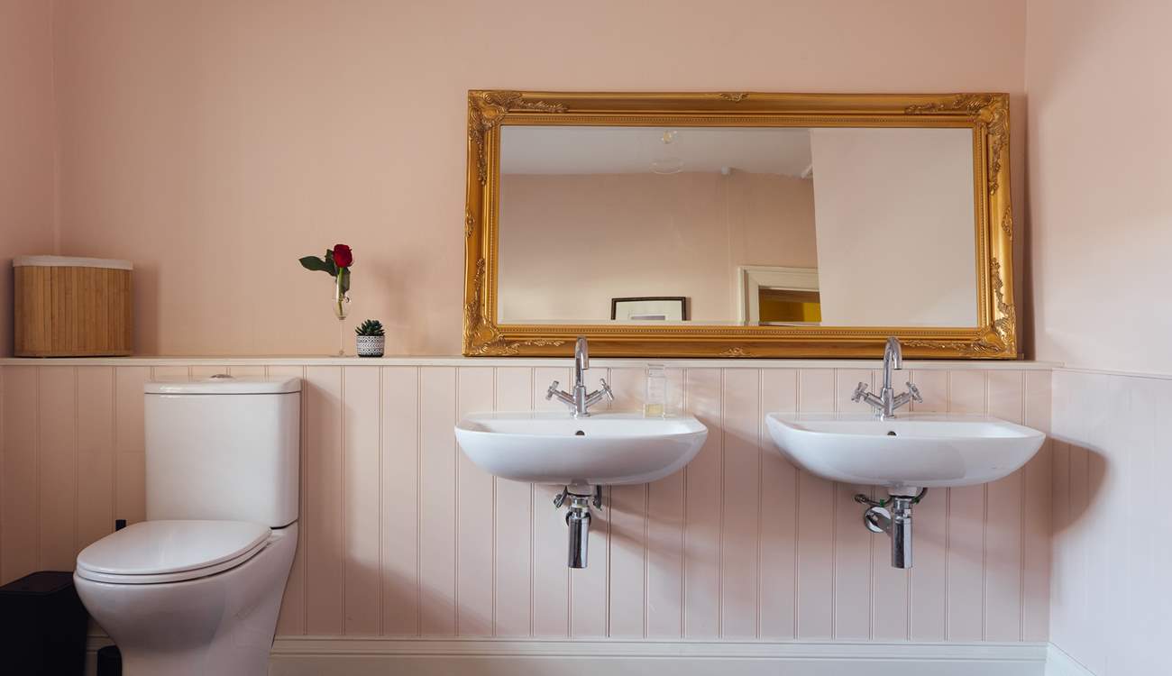 Pretty pinks in the family bathroom. 